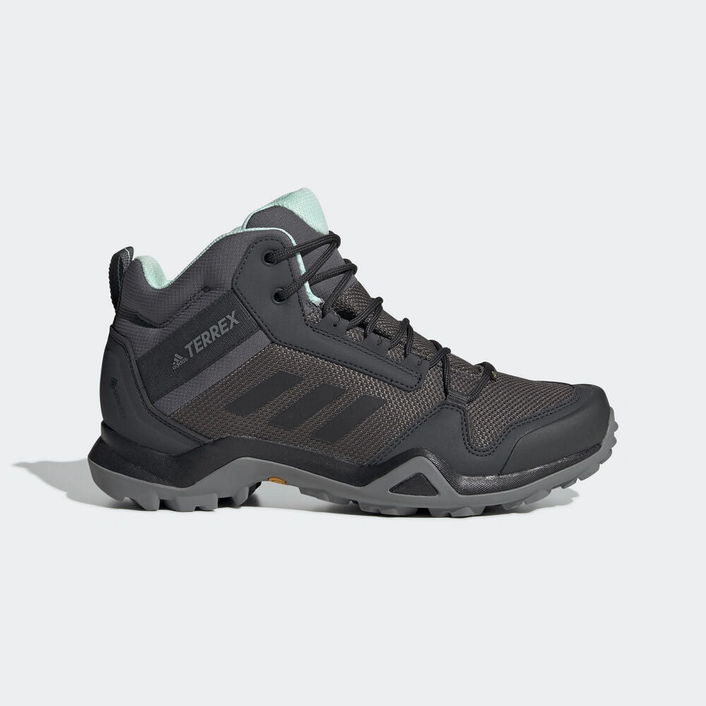 adidas TERREX Mujer AX3 Mid GTX: Aventura Total, Protección y Estilo Imparable.